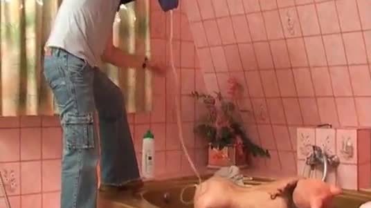 Kinky bdsm session in bathroom where